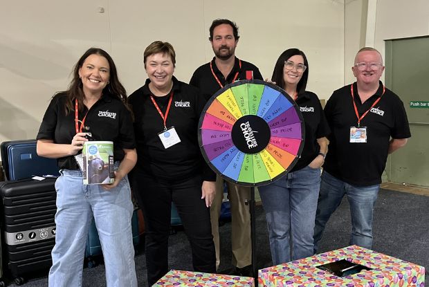 Travellers Choice members volunteered to run the spinning wheel to raise funds for Bong Bong
